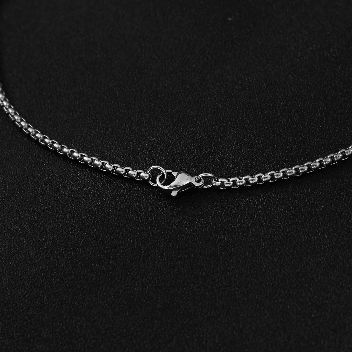 NOIR CROSS PENDANT NECKLACE